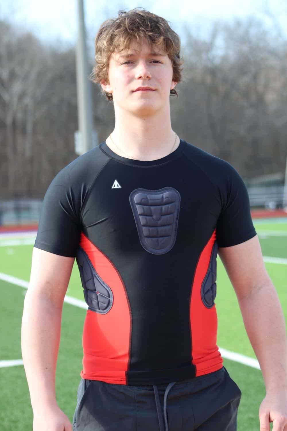 Protective football body armor, speed training gear, high-performance athletic compression clothing for sports, football, and training. Perfect for athletes seeking enhanced safety and performance.